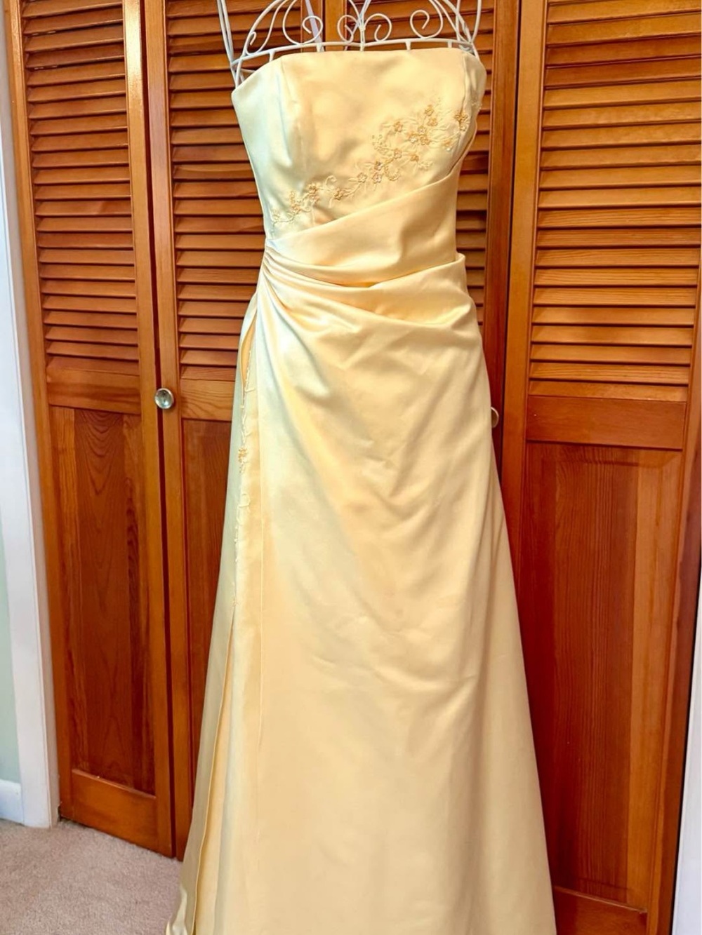 David's Bridal Strapless Satin Formal Gown in a light buttery yellow